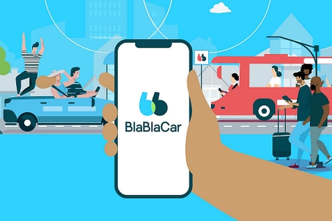 A hand holding a phone with the BlaBlaCar app, carpoolers and a cityscape behind
