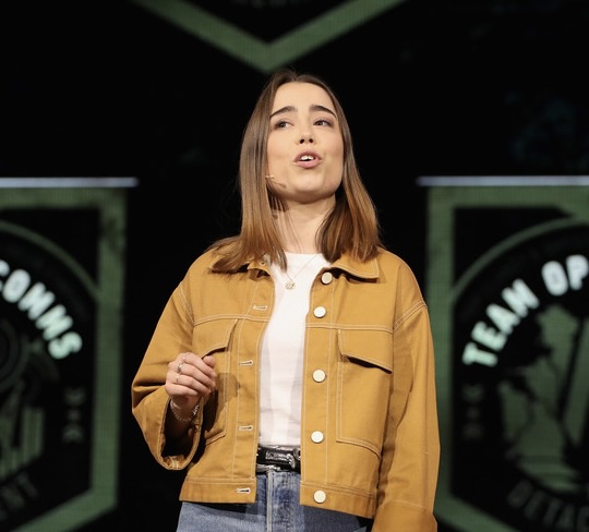 Laura Cordrey speaking on stage at E3